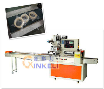 Adhesive tape packing machine