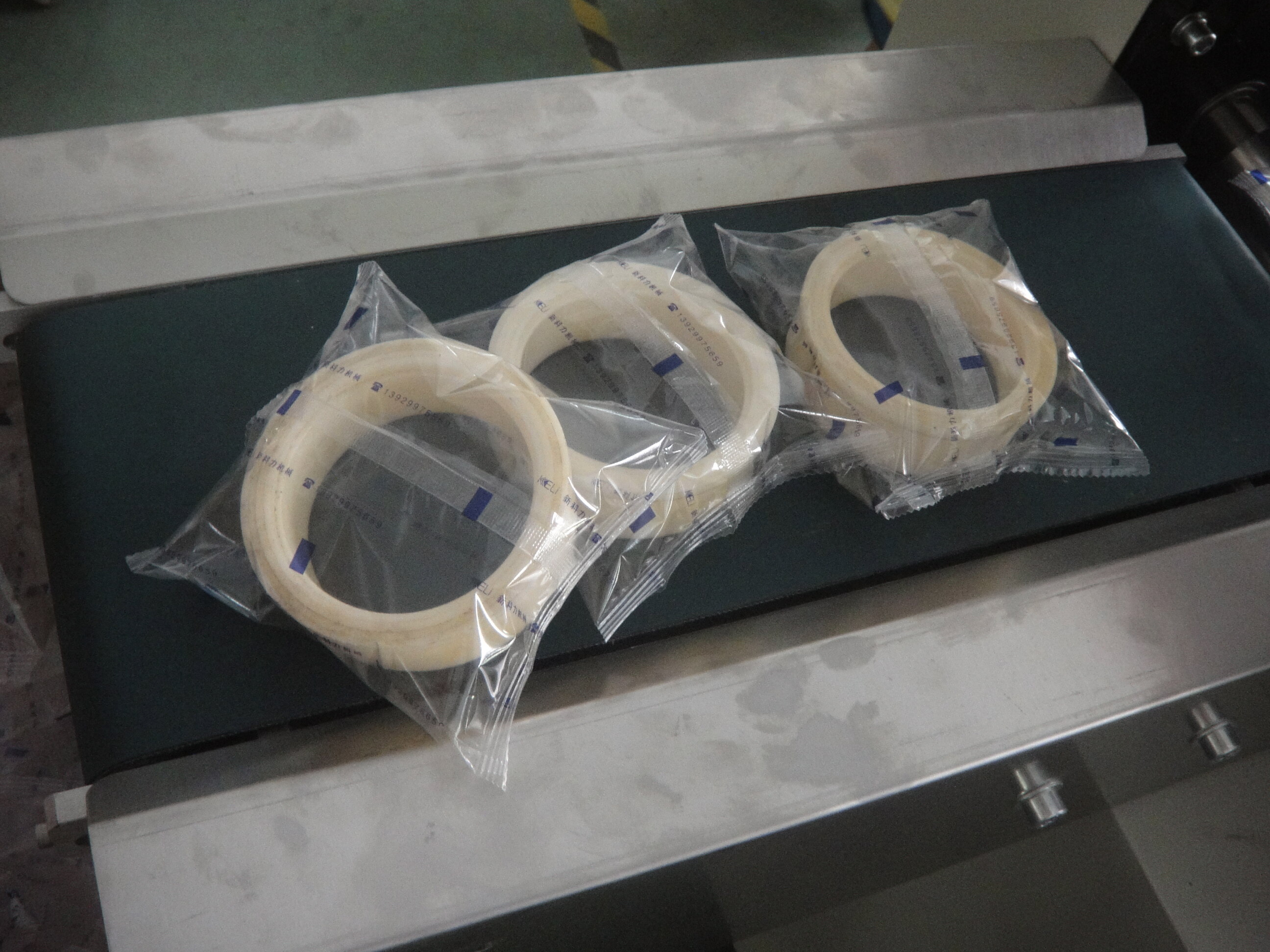 Adhesive tape packing machine